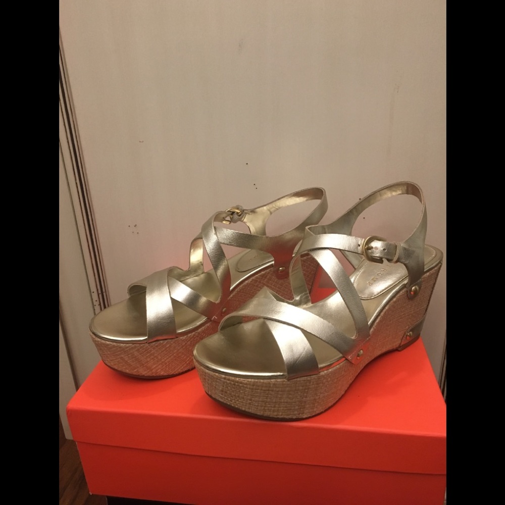 Ivanka Trump gold wedge sandals